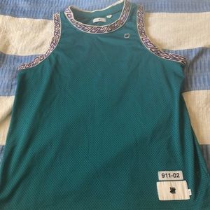 Teal Undefeated jersey